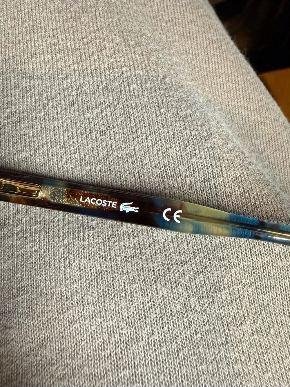 Lacoste Women's Tortoise Round Frame Glasses with Green-Blue Marble Temples